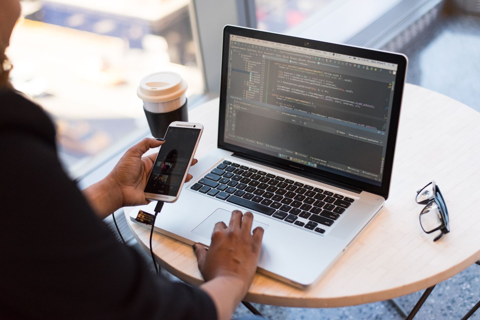 Person approving a two-factor authentication prompt on a smartphone.